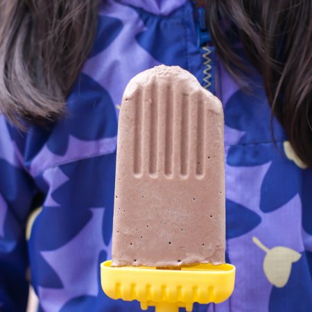 Rich and fudgy Date Sweetened Creamy Vegan Fudgesicles. Your kids will never suspect there isn't an ounce of sugar in these fudgesicles. None.