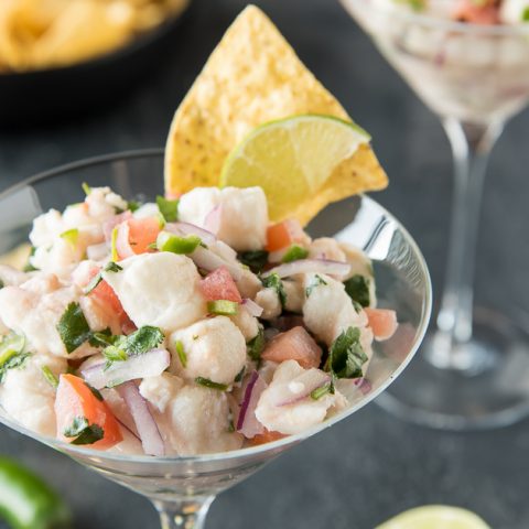 fresh & spicy halibut ceviche recipe in cup with tortilla chip